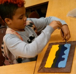 A child painting a picture